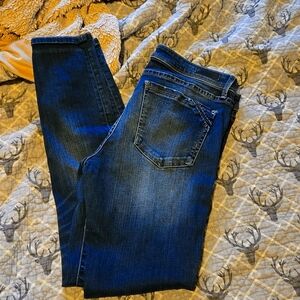 Buckle black skinny jeans